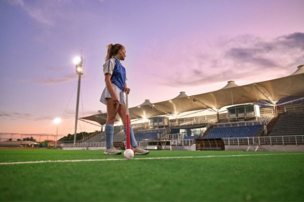 Floodlit hockey astro pitch at night